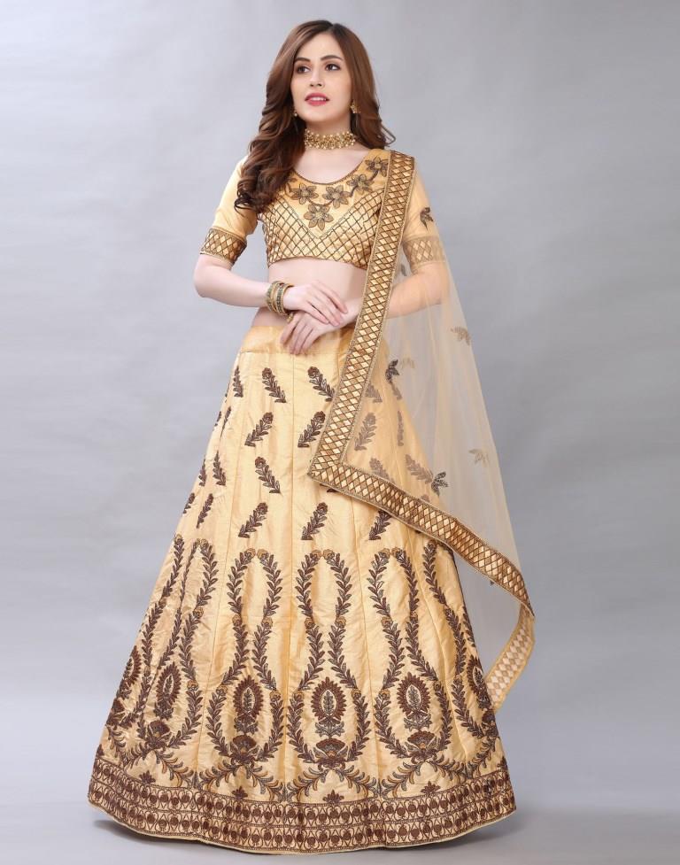 Bedazzling Cream Coloured Satin Silk Embroidered Casual Wear Lehenga