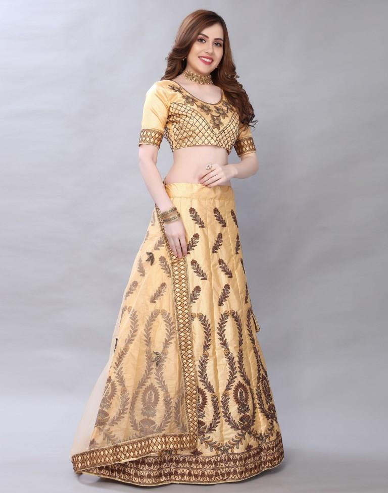 Bedazzling Cream Coloured Satin Silk Embroidered Casual Wear Lehenga