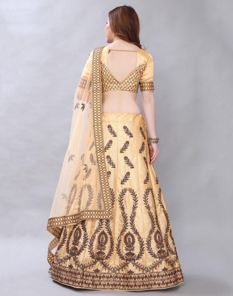 Bedazzling Cream Coloured Satin Silk Embroidered Casual Wear Lehenga