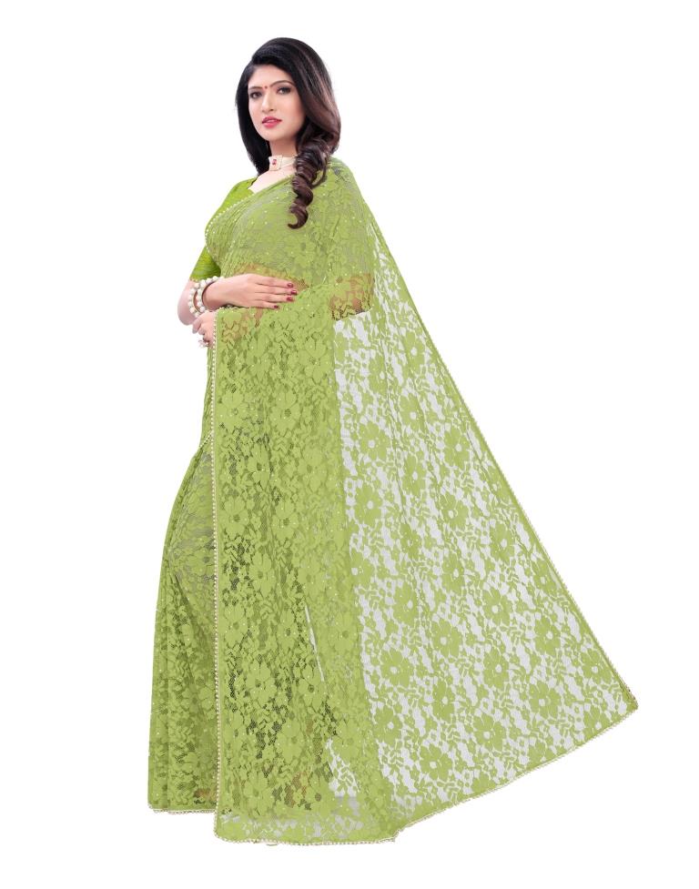 Parrot Green Coloured Embellished Russel Net Saree