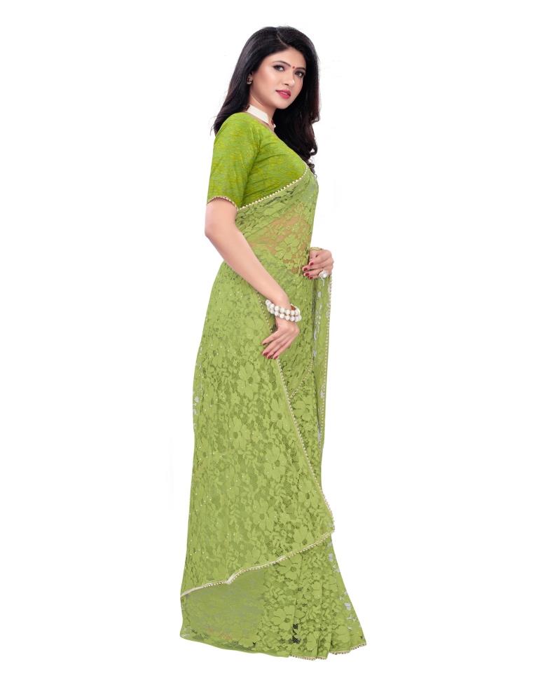 Parrot Green Coloured Embellished Russel Net Saree