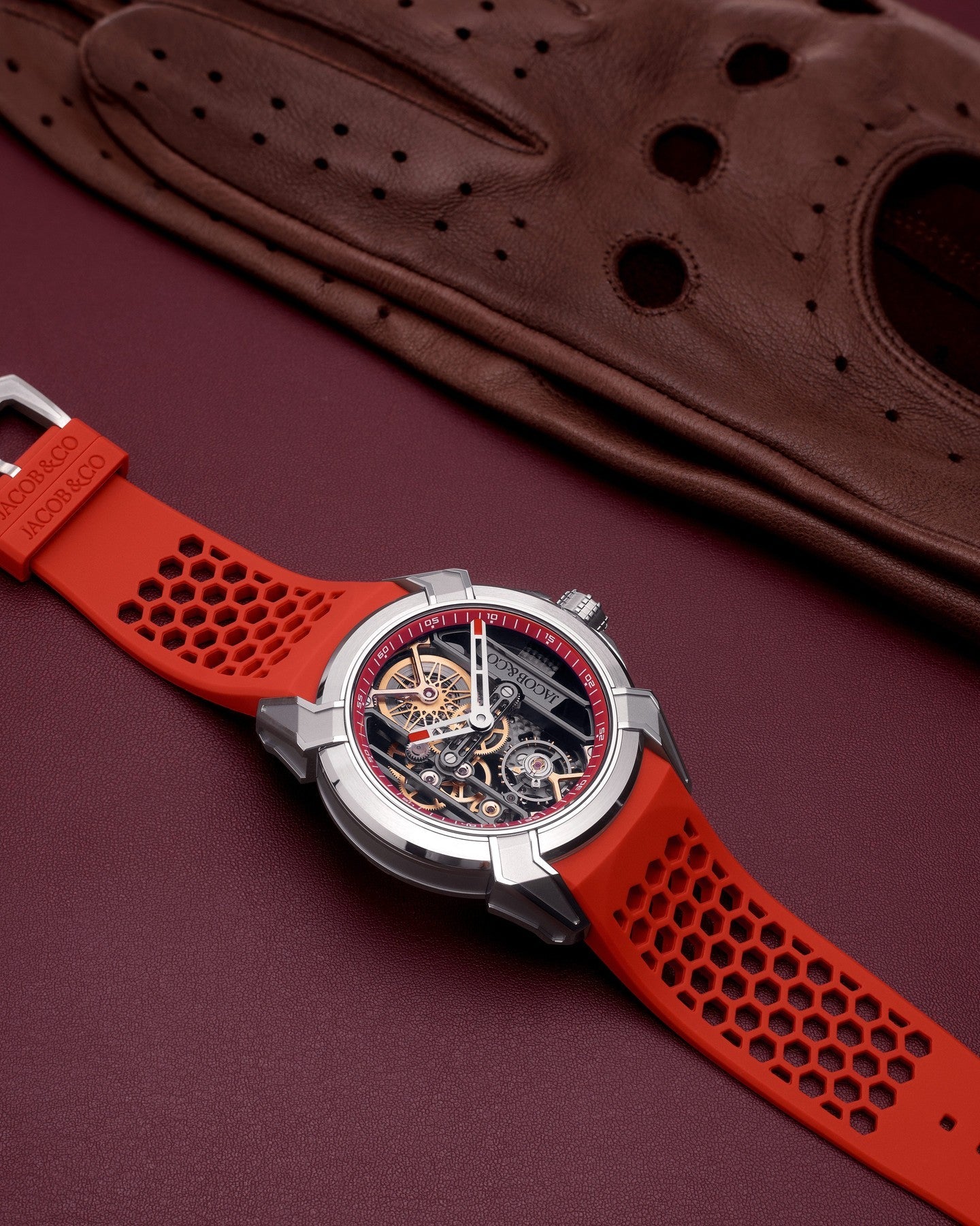 Limited Edition Jacob & Co. Epic X Skeleton watch with an orange rubber strap.