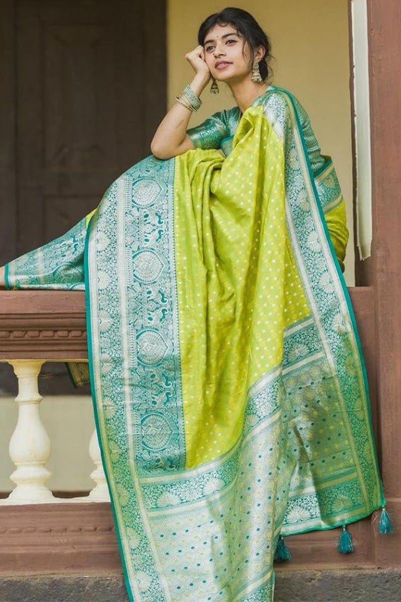 Gratifying Parrot Soft Silk Saree With Elegant Blouse Piece