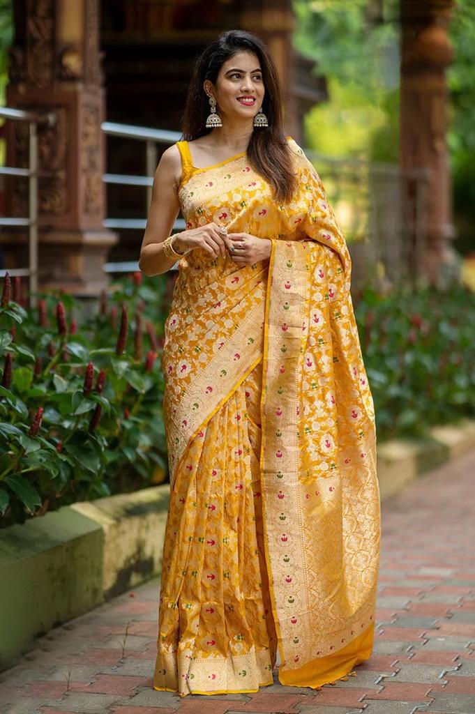 Eye-Catching Yellow Soft Silk Saree With Engrossing Blouse Piece