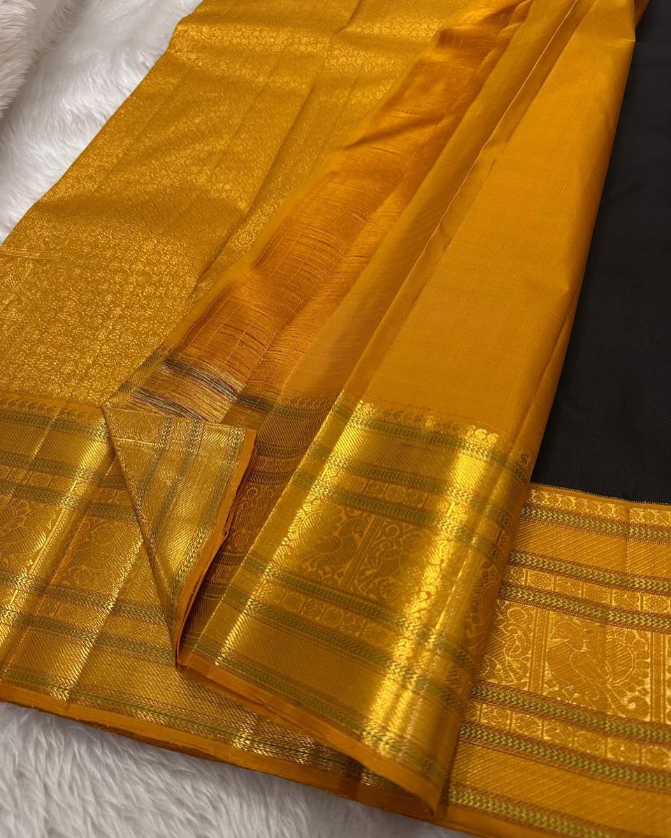 Beguiling Black Soft Silk Saree With Ethereal Blouse Piece