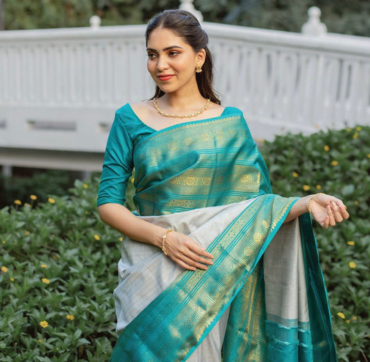 Extraordinary Off White Soft Silk Saree With Precious Blouse Piece