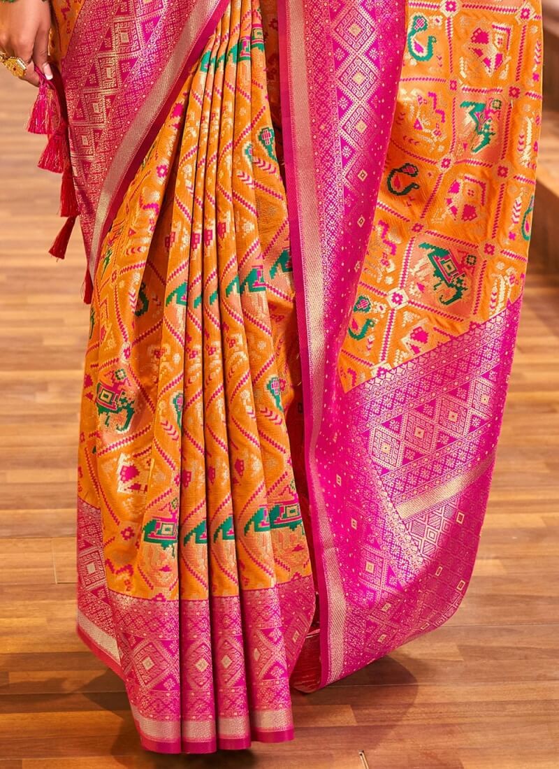 Lovely Orange Patola Silk Saree with Sensational Blouse Piece