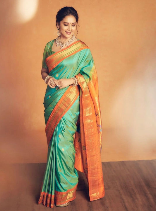 Exuberant Firozi Soft Silk Saree With Surreptitious Blouse Piece