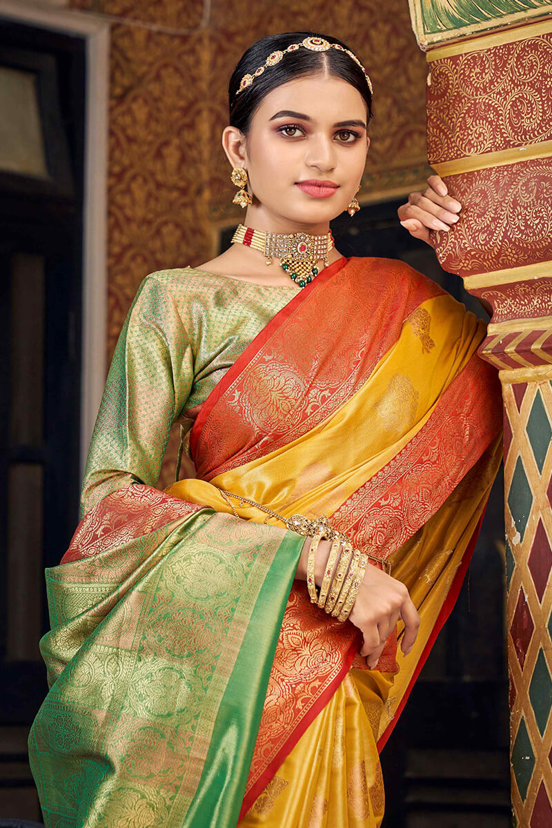 Eye-catching Yellow Soft Banarasi Silk Saree With Beautiful Blouse Piece