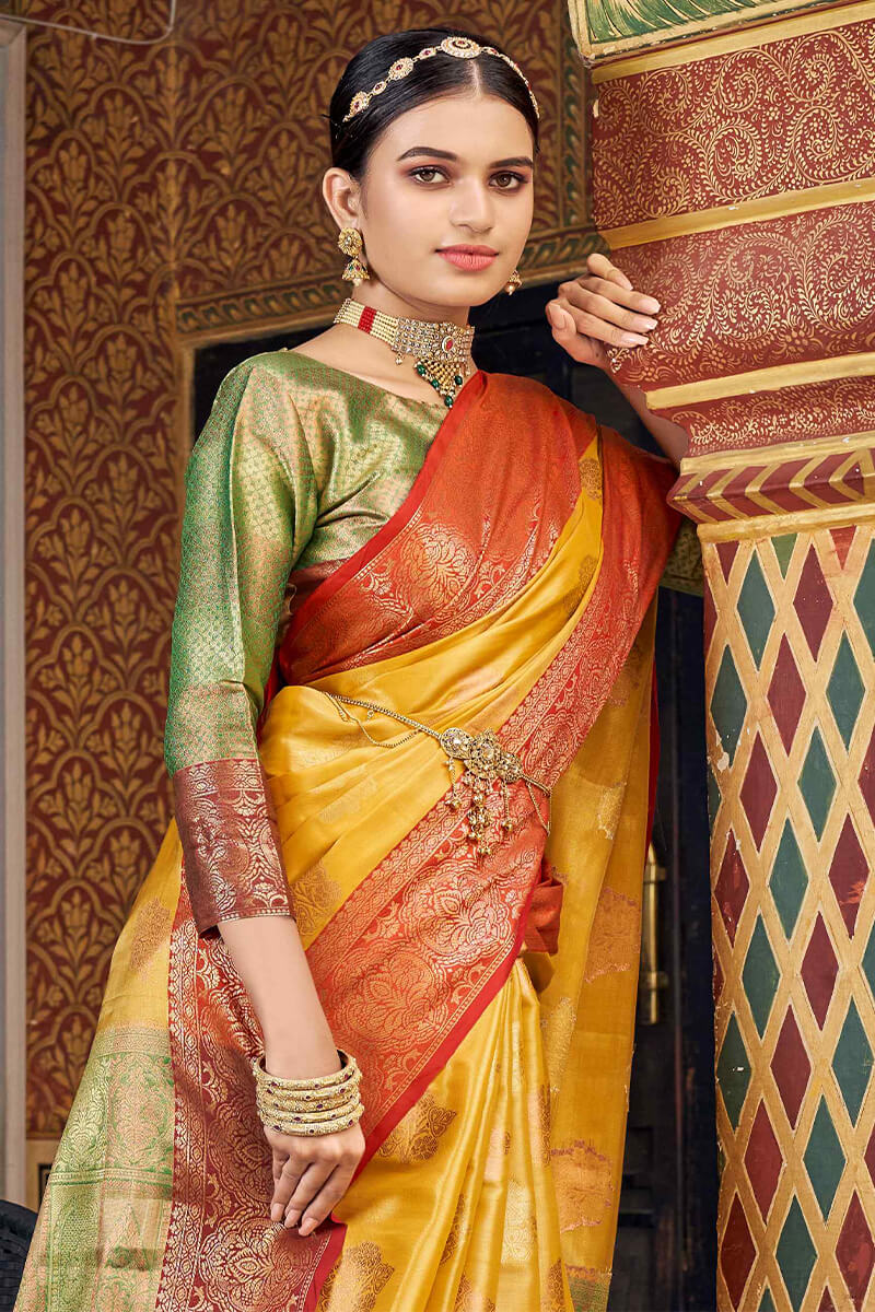 Eye-catching Yellow Soft Banarasi Silk Saree With Beautiful Blouse Piece