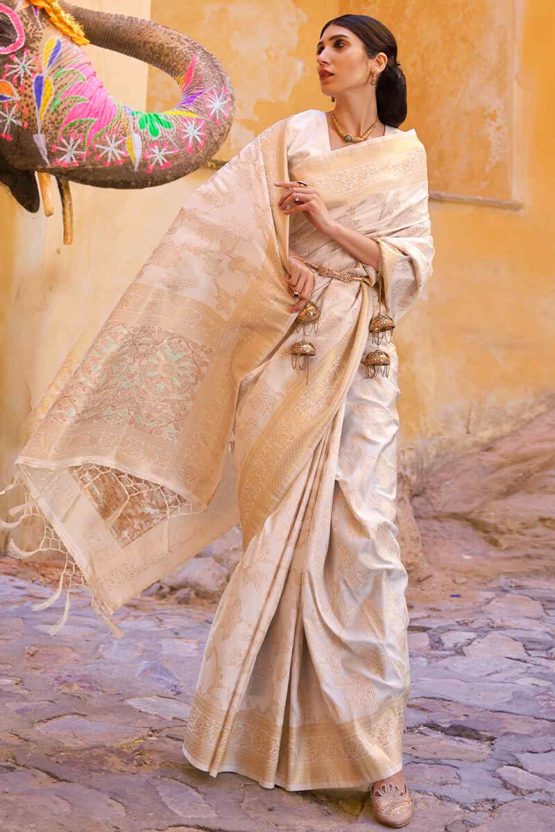 Alluring Beige Soft Banarasi Silk Saree With Radiant Blouse Piece