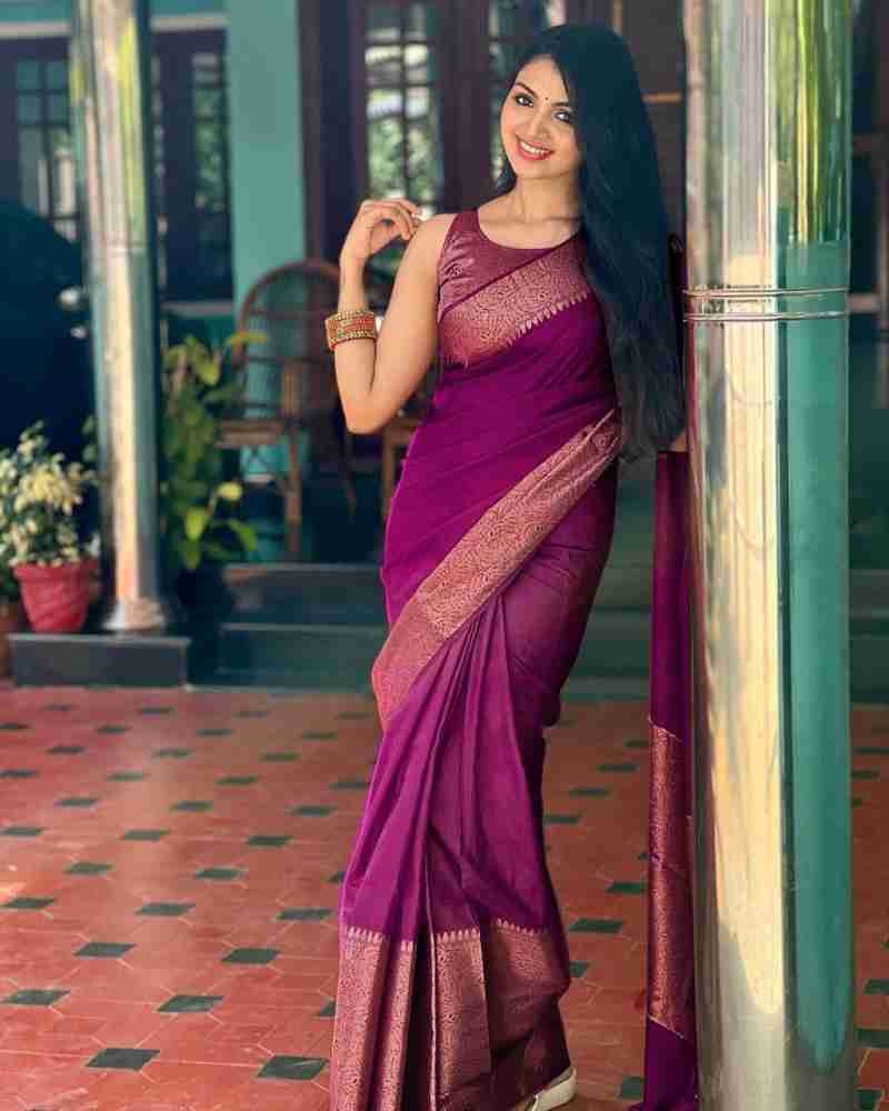 Adorning Purple Soft Silk Saree With Gratifying Blouse Piece