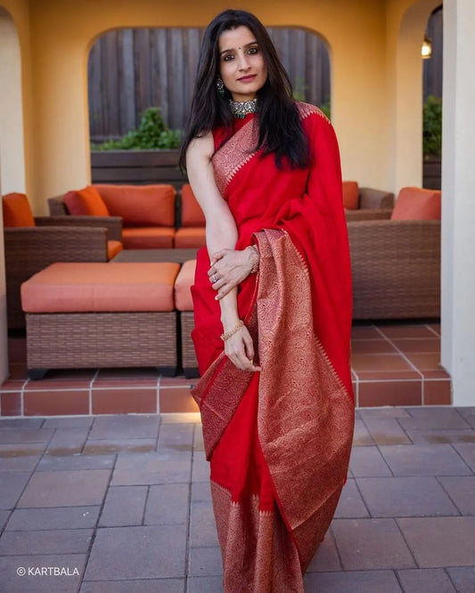 Adorning Red Soft Silk Saree With Unequalled Blouse Piece