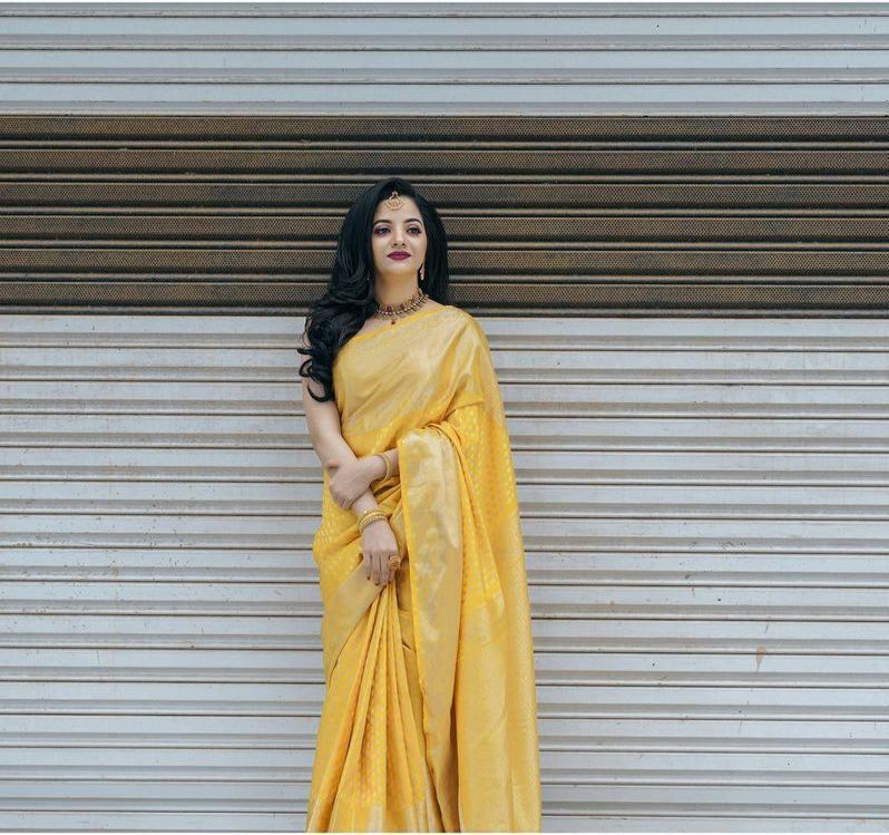 Extraordinary Yellow Soft Banarasi Silk Saree With Sensational Blouse Piece