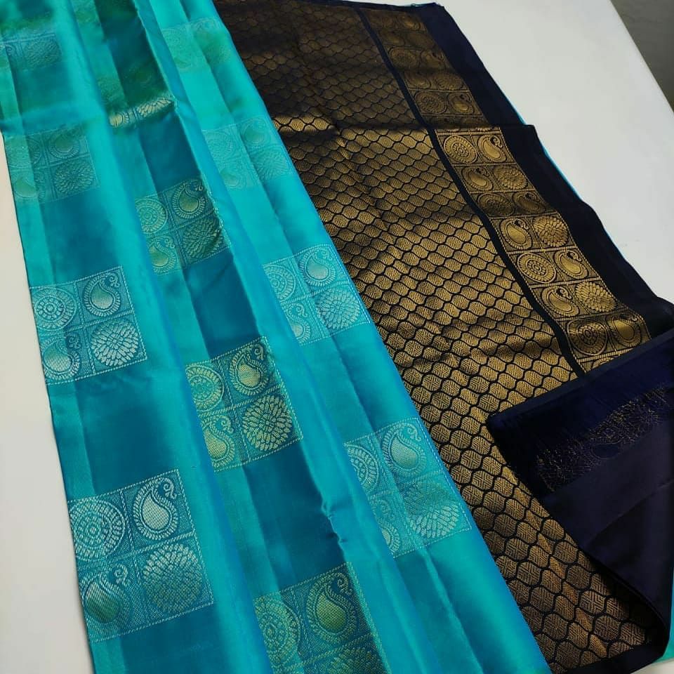 Gratifying Firozi Soft Silk Saree With Woebegone Blouse Piece