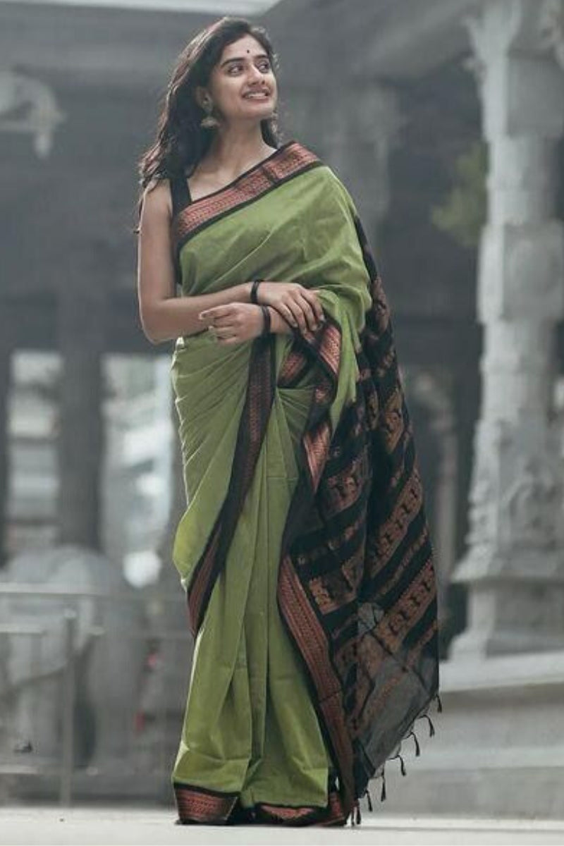 Exquisite Pista Soft Silk Saree With Ravishing Blouse Piece