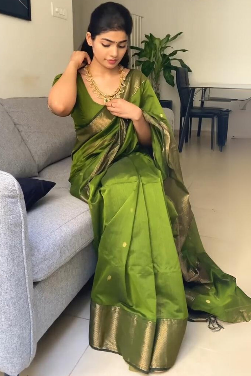 Fancifull Green Cotton Silk Saree With Hypnotic Blouse Piece