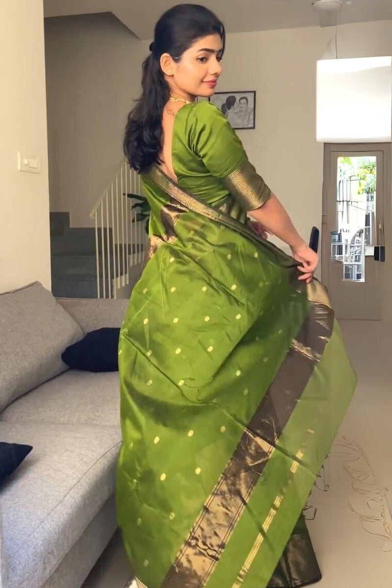 Fancifull Green Cotton Silk Saree With Hypnotic Blouse Piece