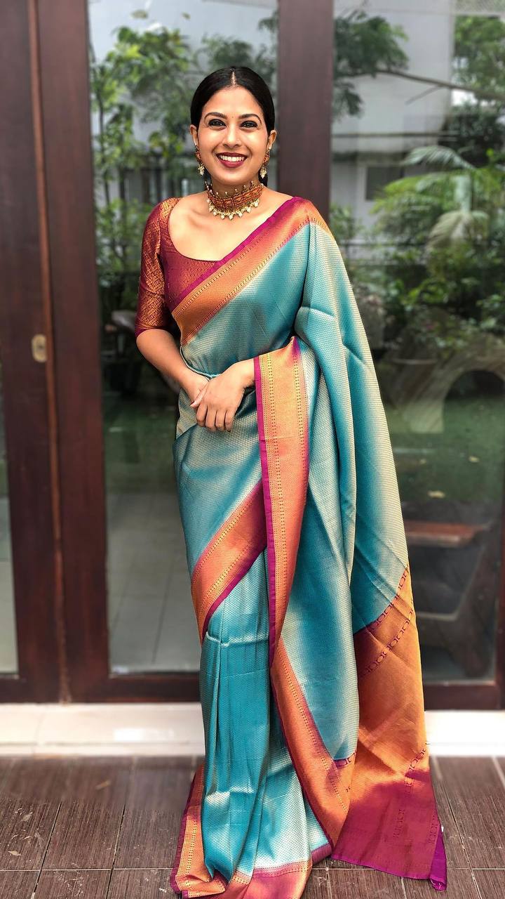 A glam Rama Soft Silk Saree with Beauteous Blouse Piece