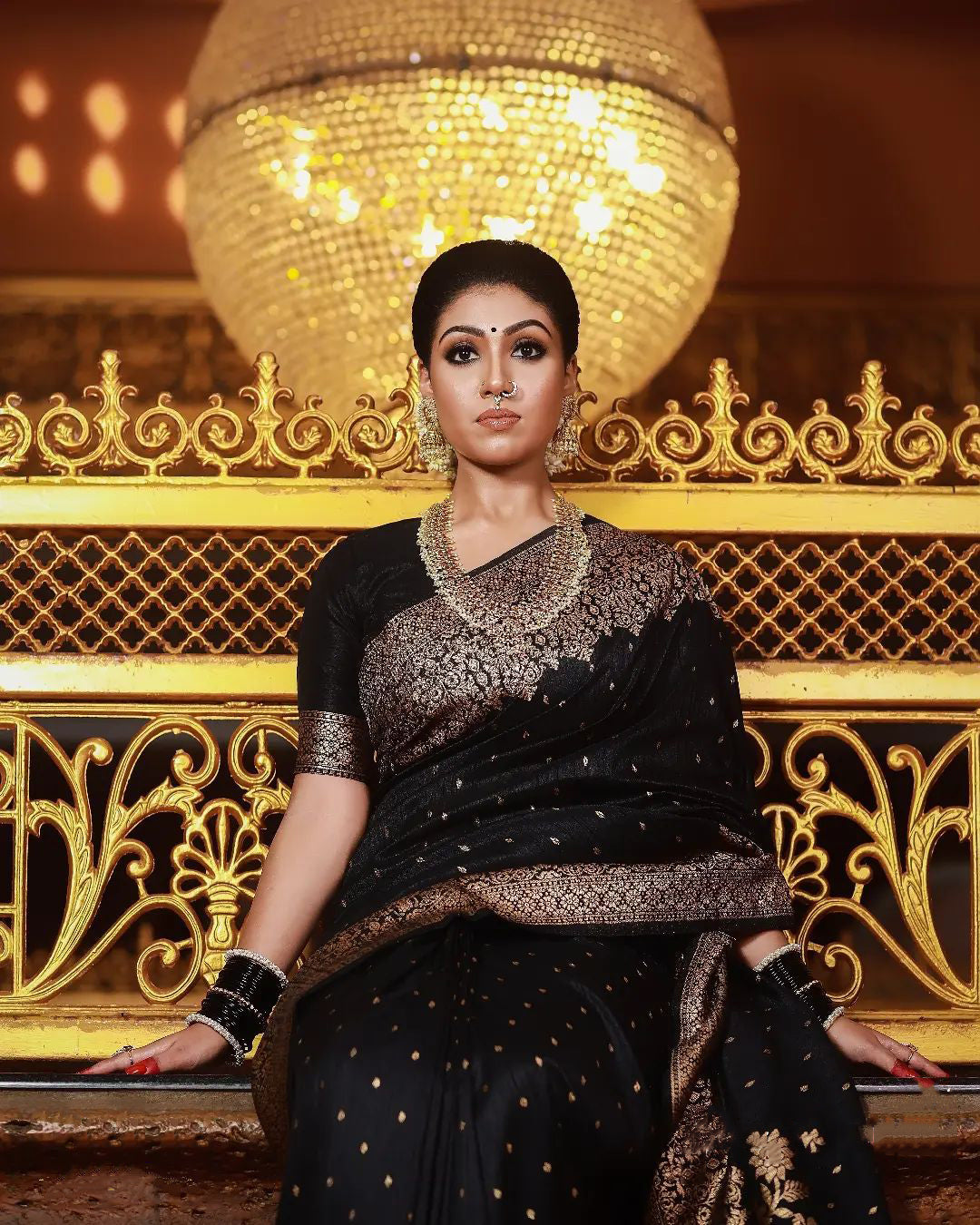 A dreamy Black Soft Banarasi silk saree With Lissome Blouse Piece