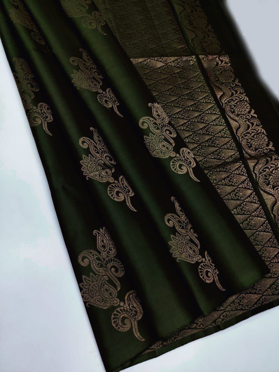 Exquisite Dark Green Soft Silk Saree With Lustrous Blouse Piece