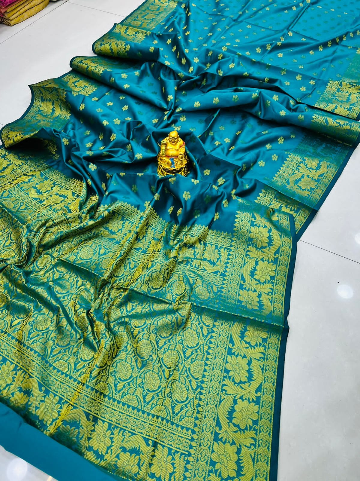 Magnetic Firozi Soft Banarasi Silk Saree With Enchanting Blouse Piece