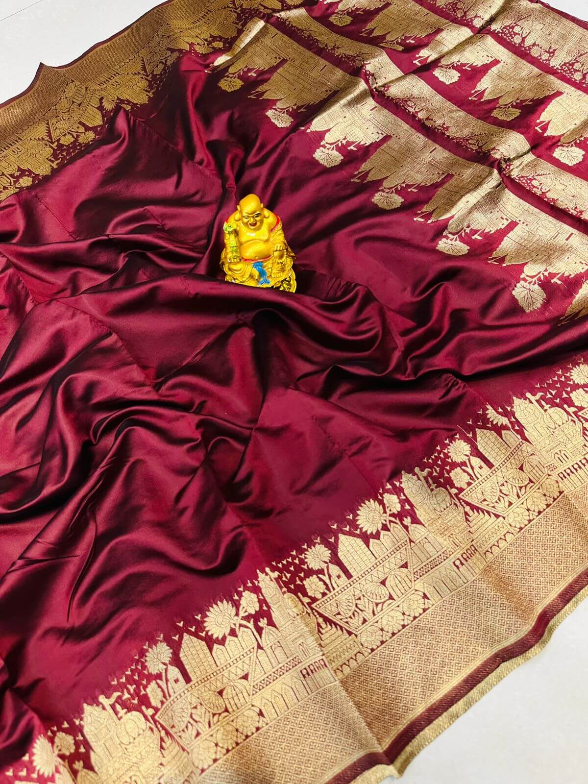 Fancifull Maroon Soft Banarasi Silk Saree With Gossamer Blouse Piece