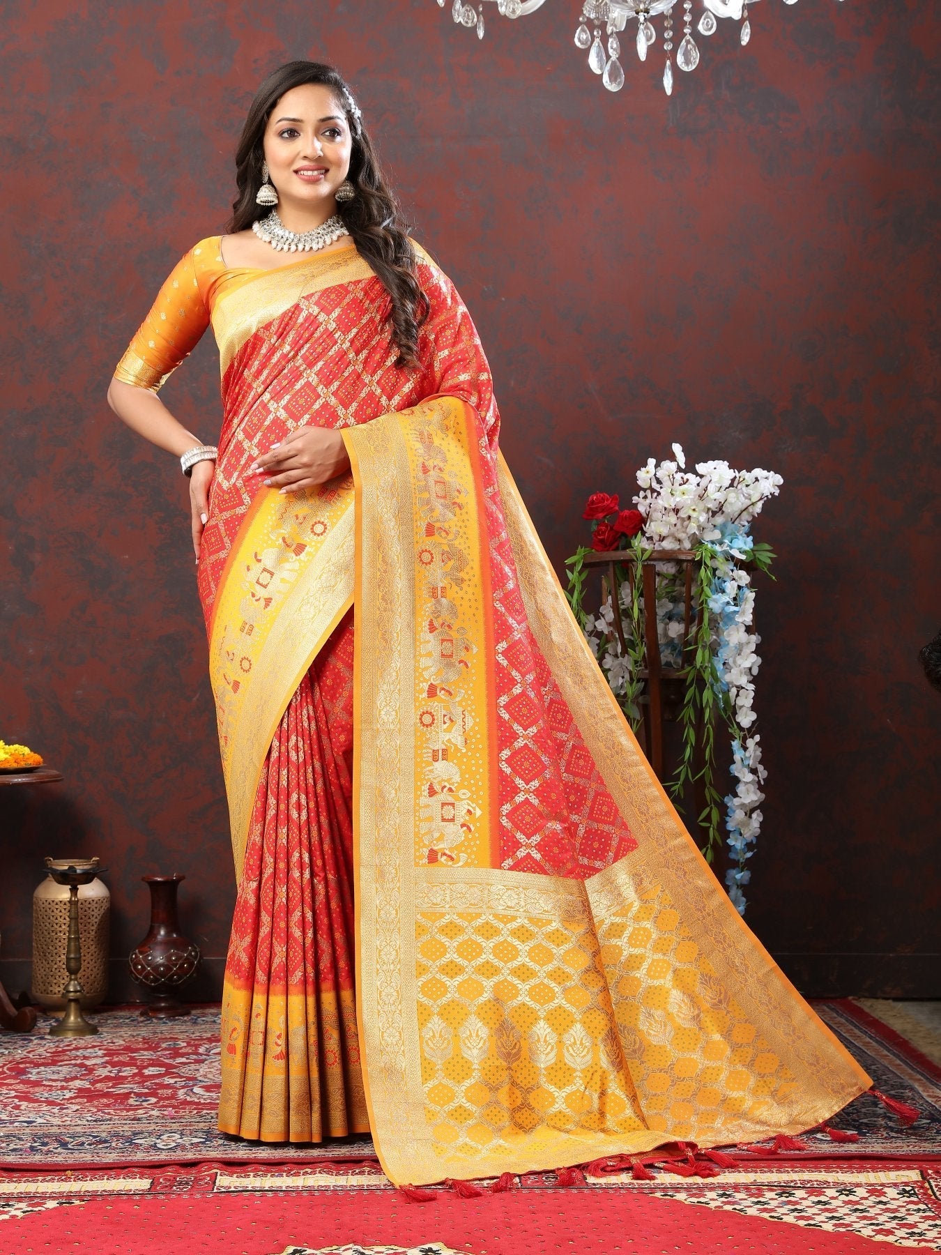 Groovy Red Patola Silk Saree with Scintillating Blouse Piece