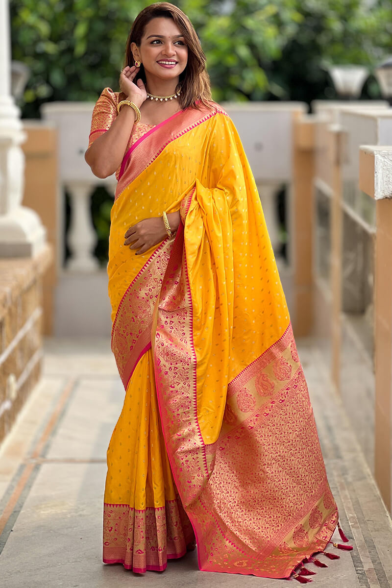 Mesmeric Yellow Soft Banarasi Silk Saree With Twirling Blouse Piece