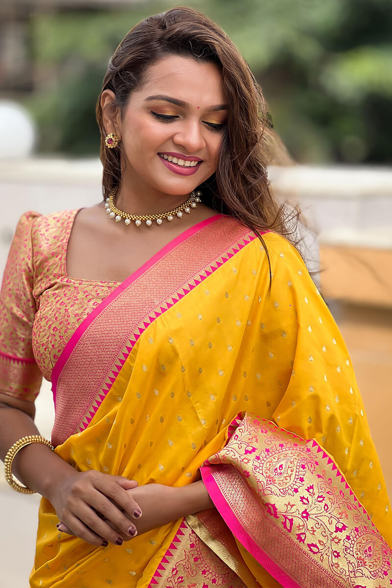 Mesmeric Yellow Soft Banarasi Silk Saree With Twirling Blouse Piece