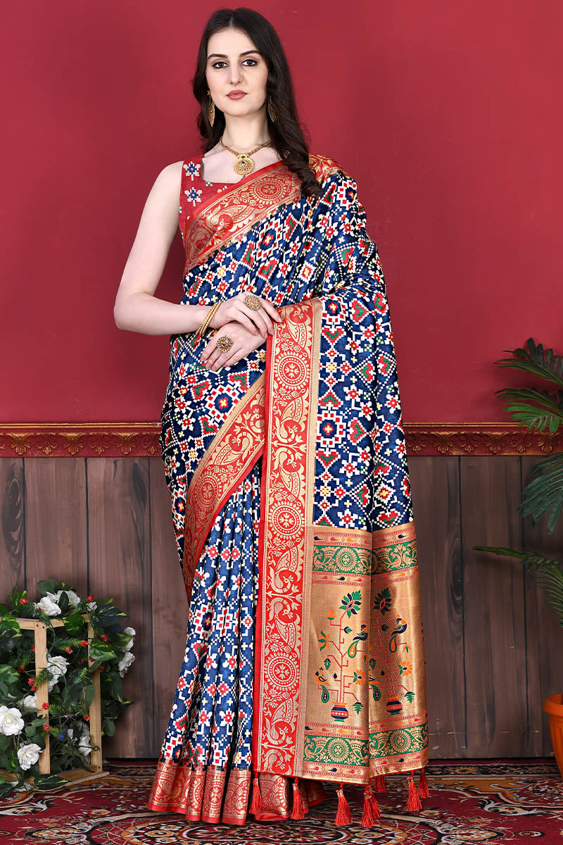 Fantabulous Blue Patola Silk Saree with Confounding Blouse Piece