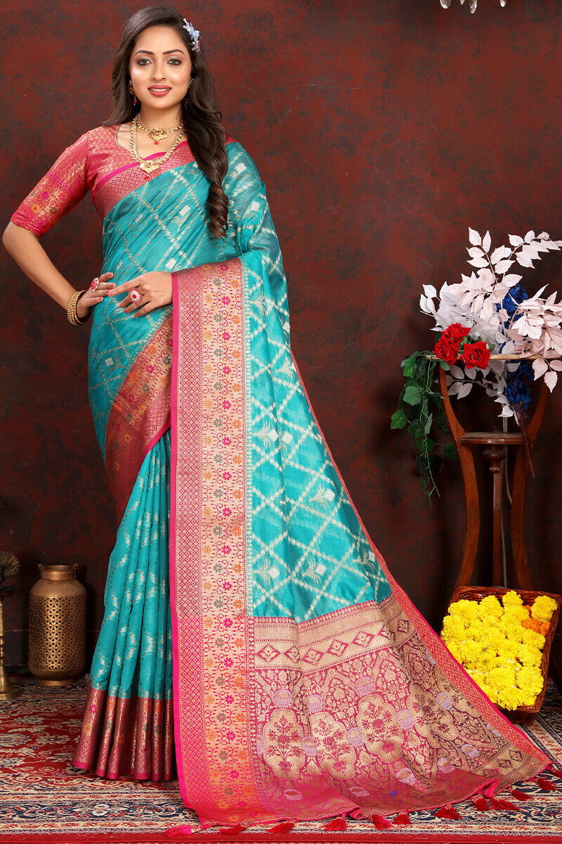 Lovely Firozi Soft Banarasi Silk Saree With Adorning Blouse Piece