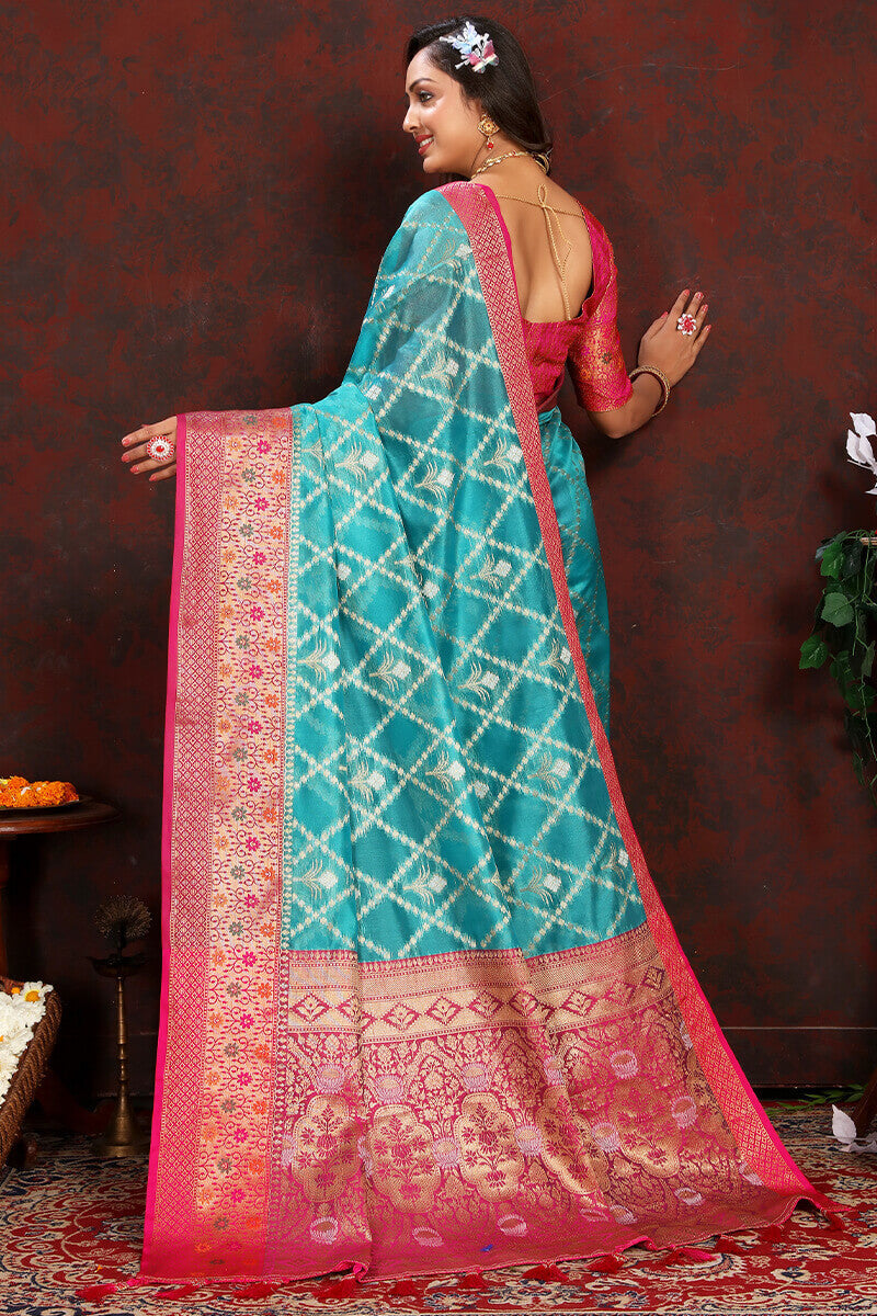 Lovely Firozi Soft Banarasi Silk Saree With Adorning Blouse Piece