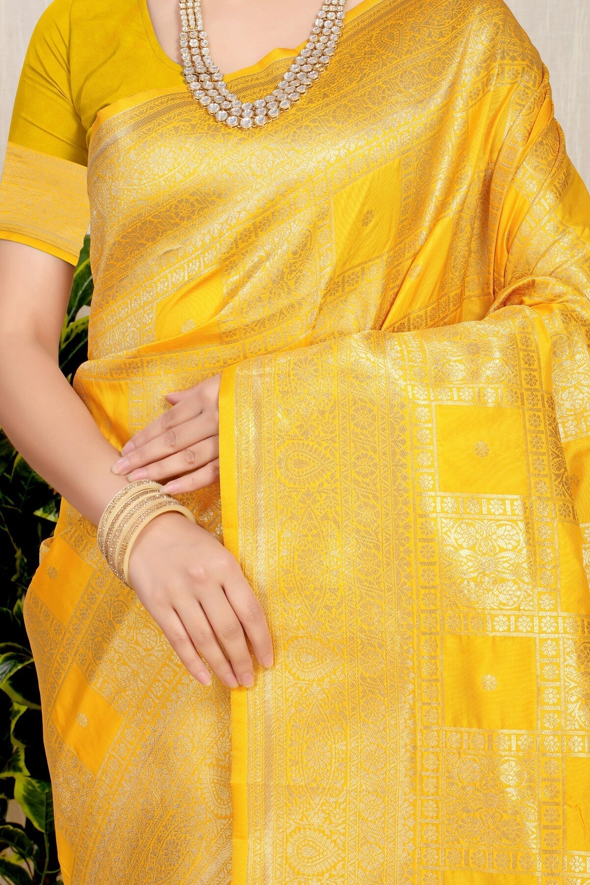 Eye-catching Yellow Kanjivaram Silk Saree With Glittering Blouse Piece