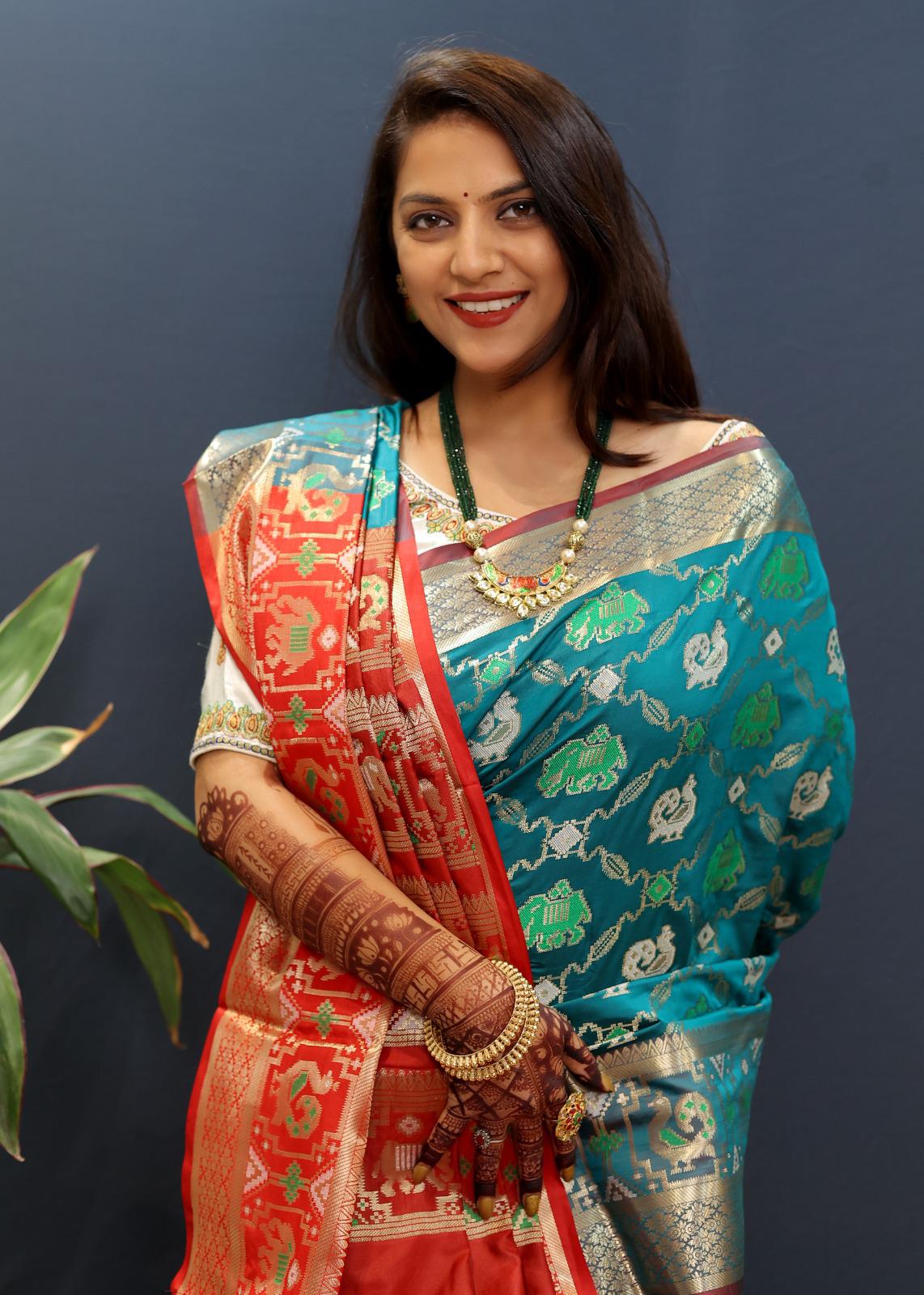 Effervescent Rama Patola Silk Saree with Piquant Blouse Piece