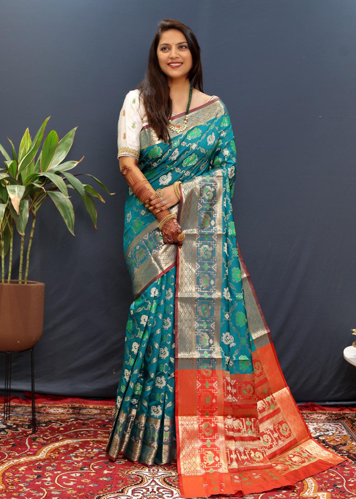 Effervescent Rama Patola Silk Saree with Piquant Blouse Piece