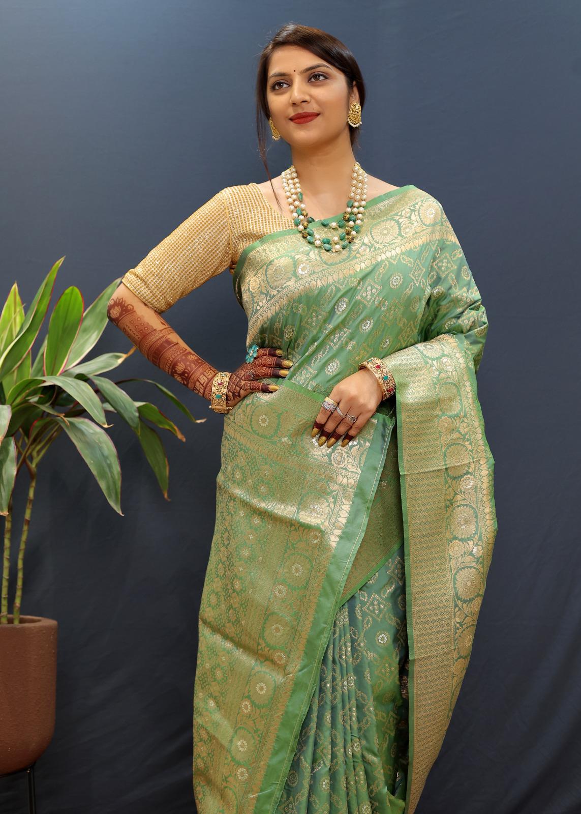 Confounding Sea Green Soft Banarasi Silk Saree With Smashing Blouse Piece