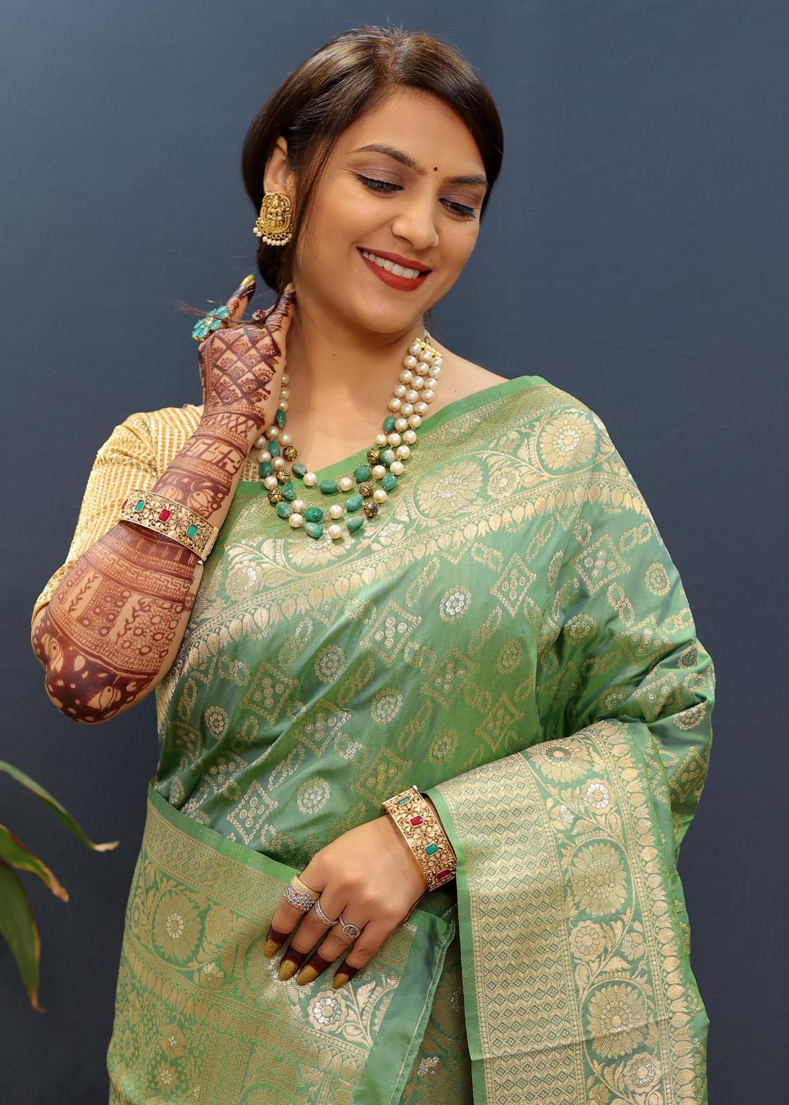 Confounding Sea Green Soft Banarasi Silk Saree With Smashing Blouse Piece