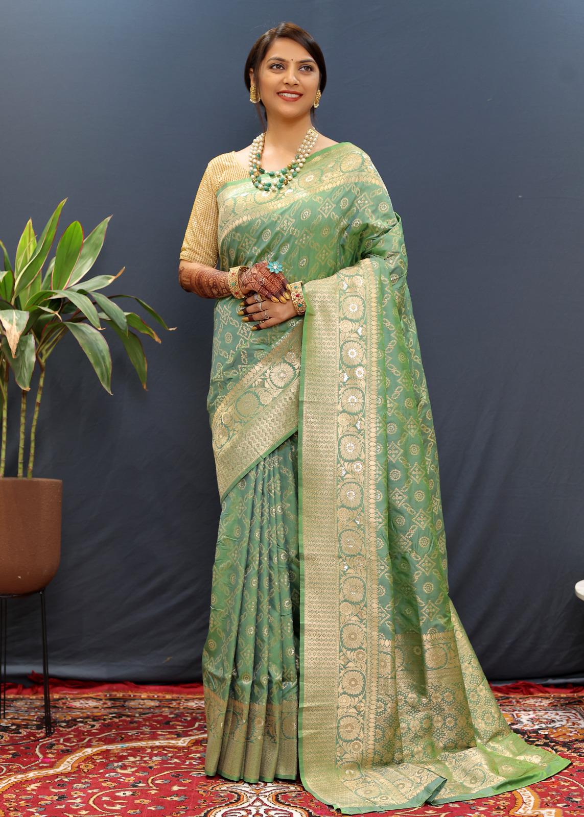 Confounding Sea Green Soft Banarasi Silk Saree With Smashing Blouse Piece