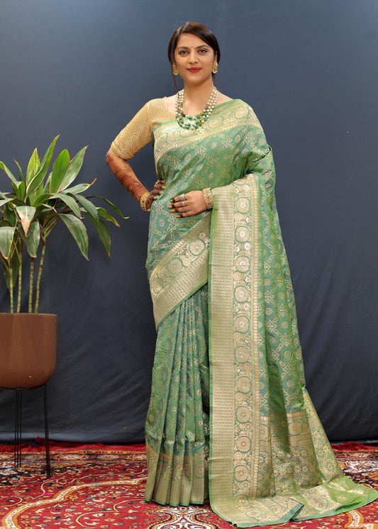 Confounding Sea Green Soft Banarasi Silk Saree With Smashing Blouse Piece