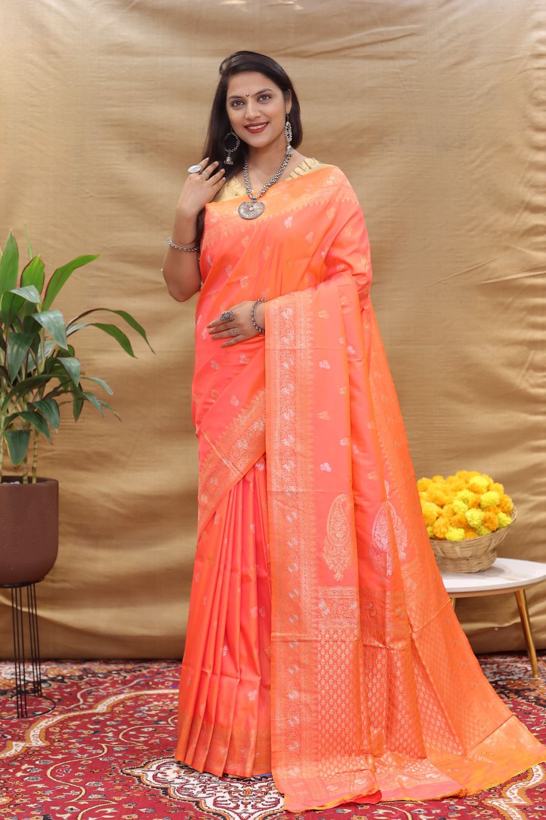 Cynosure Peach Soft Banarasi Silk Saree With Evocative Blouse Piece