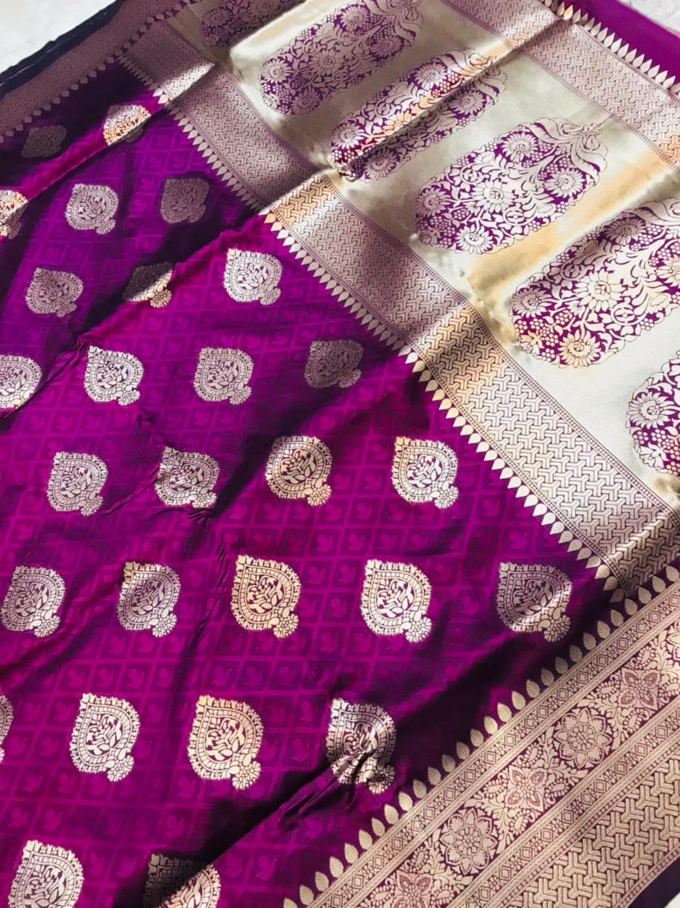 Gossamer Wine Kanjivaram Silk With Super extravagant Blouse Piece