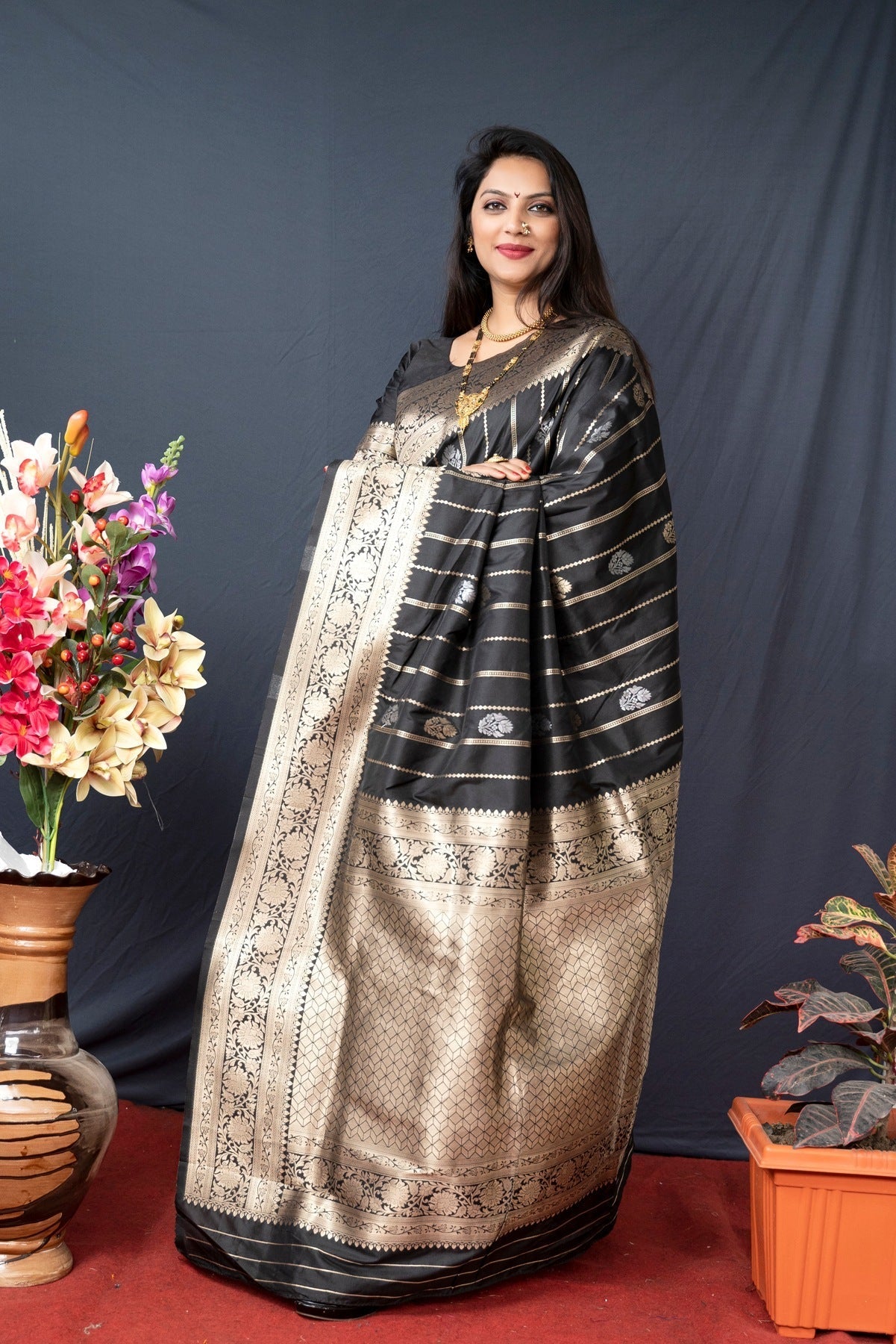 Extraordinary Black Banarasi Silk Saree With Pretty Blouse Piece