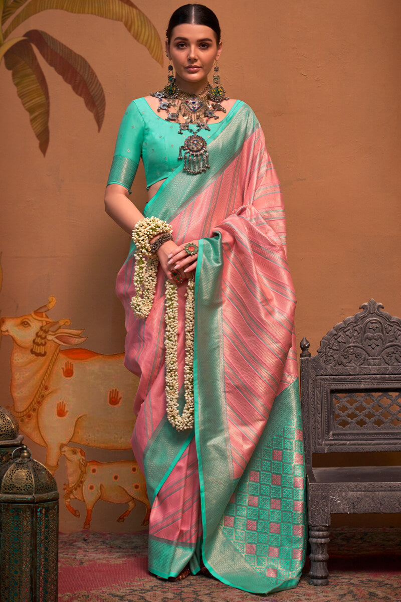 Cynosure Pink Soft Banarasi Silk Saree With Evanescent Blouse Piece