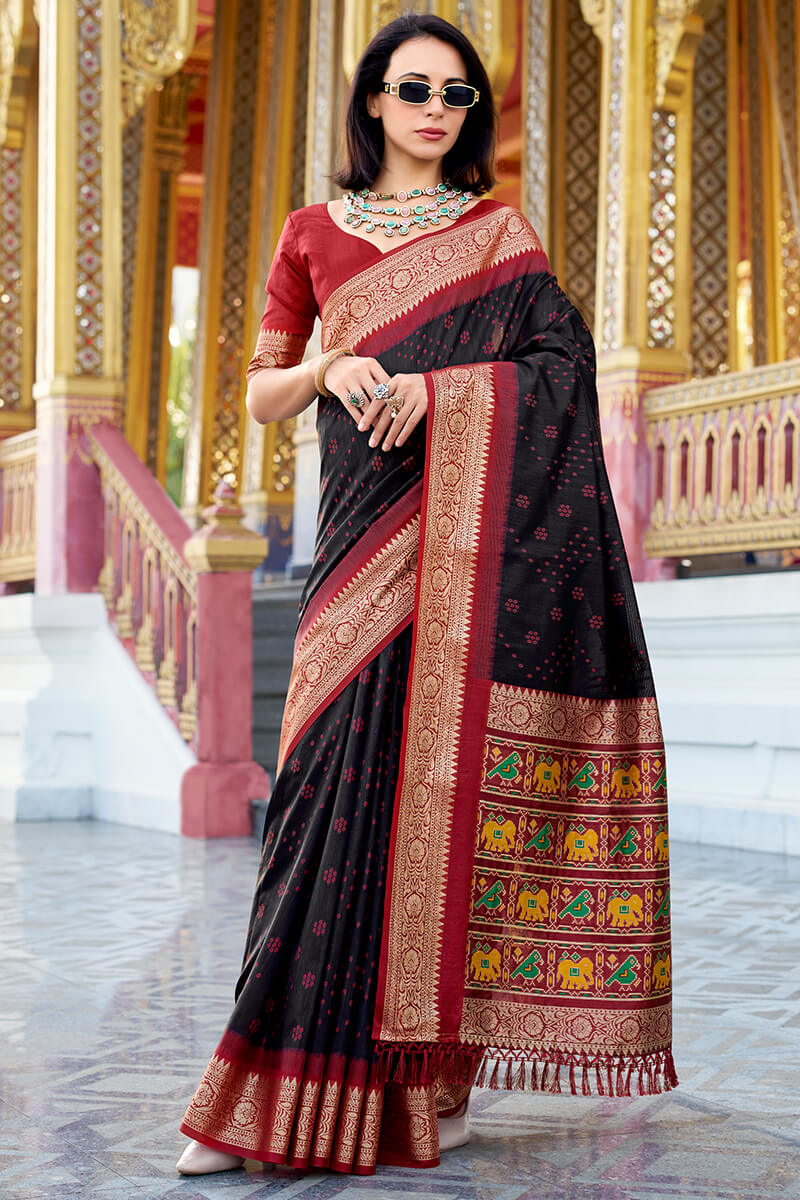 Lassitude Black Patola Silk Saree with Propinquity Blouse Piece