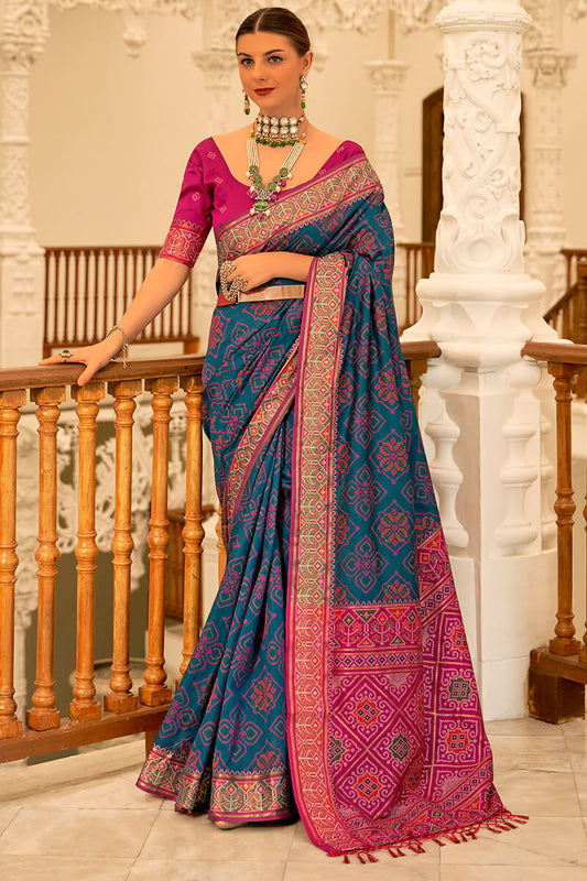 Intricate Navy Blue Patola Silk Saree with Adorning Blouse Piece