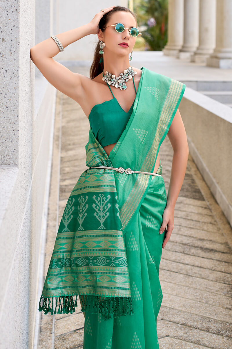 Exquisite Sea Green Soft Banarasi Silk Saree With Pulsating Blouse Piece