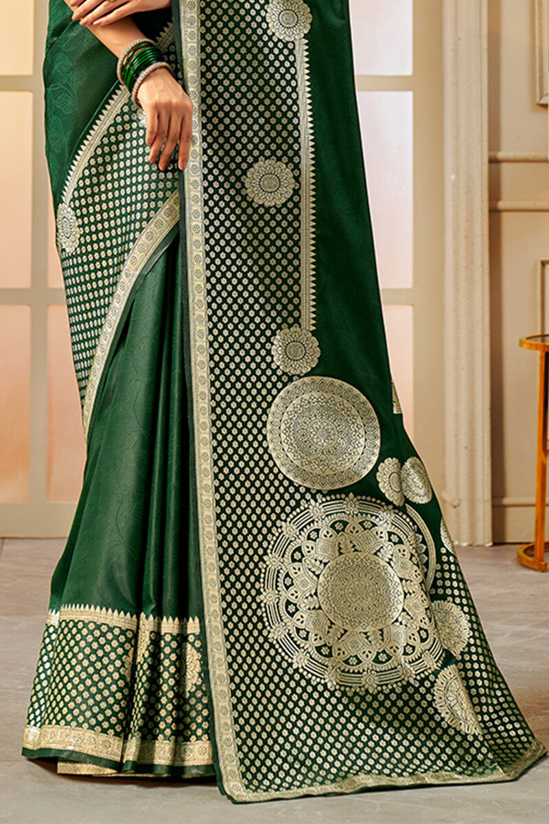 Bewitching Dark Green Soft Banarasi Silk Saree With Desultory Blouse Piece