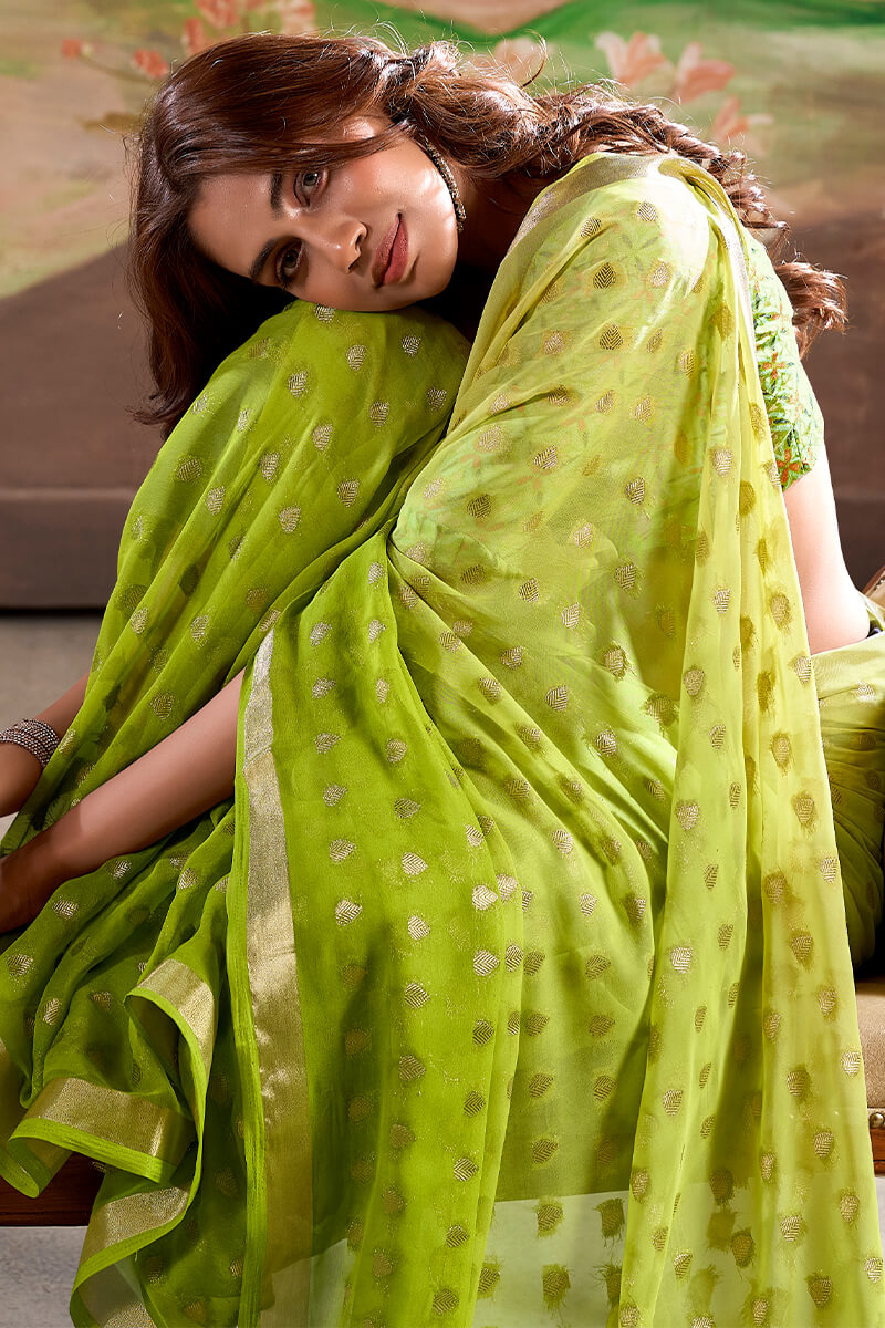 Extraordinary Parrot Georgette Banarasi Silk Saree With Gorgeous Blouse Piece