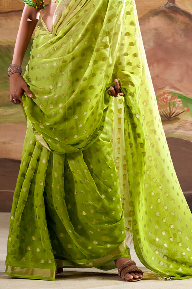 Extraordinary Parrot Georgette Banarasi Silk Saree With Gorgeous Blouse Piece